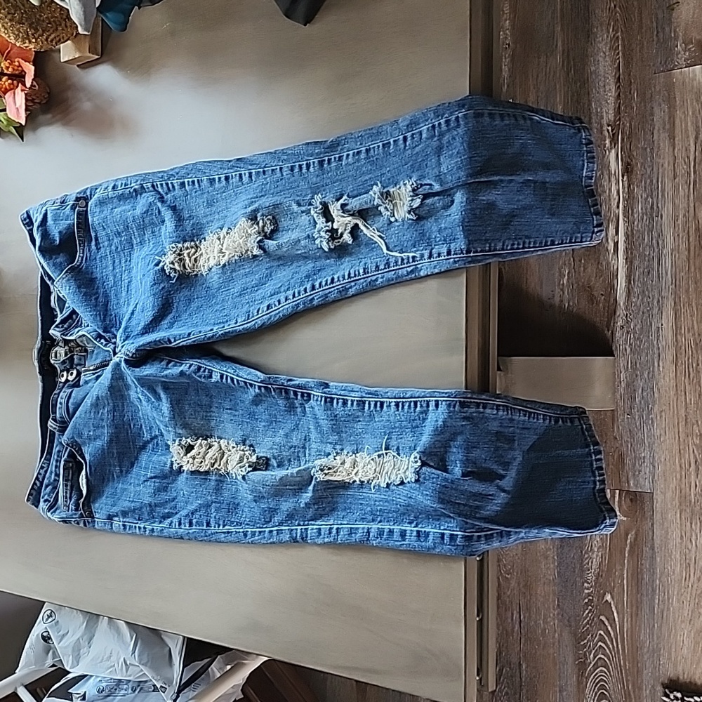 Ripped blue jeans. Size 18 READ DESCRIPTION